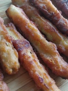 Una foto de Palitos de calabacín en tempura a la miel