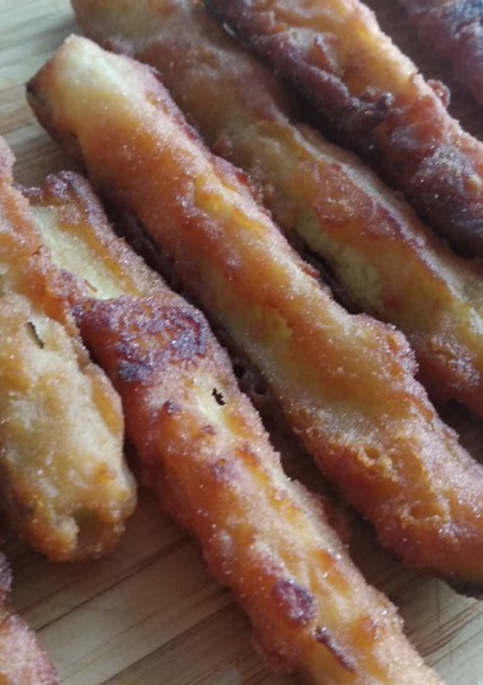 Una foto de Palitos de calabacín en tempura a la miel