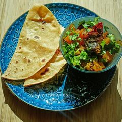 A picture of Pumpkin Stirfry with Multigrain Fulkas.