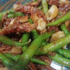 A picture of Chilli ginger garlic pickle with left over pickle masala.