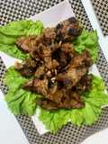 Grilled mutton chops dipped in herb and lemon peri peri sauce