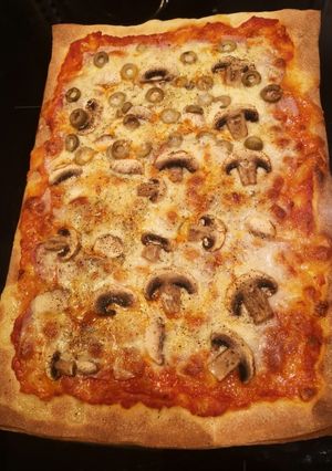 Une photo de Pizza