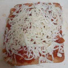 A picture of Bread Pizza 🍕🍅🍕 in a pan.