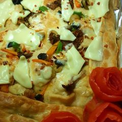 A picture of Puff pastry BBQ chicken pizza.