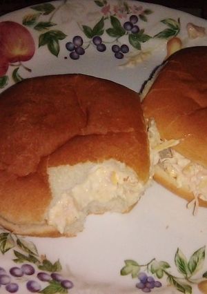 A picture of Chicken 🐔 salad sandwich 🥪 with cheese 🧀.