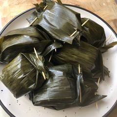 A picture of Lemper Ayam (Steamed Sticky Rice with Umami Chicken Layered).