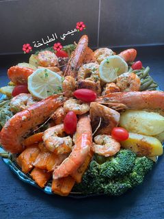 صورة لوصفة طبق الخضر بالسلمون و الجمبري 🦐