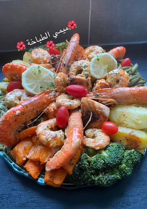 صورة لوصفة طبق الخضر بالسلمون و الجمبري 🦐
