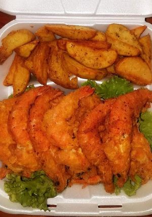 Una foto de Camarones empanizados