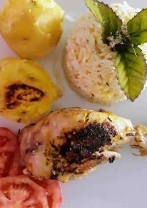 Una foto de Arroz y Pollito Frito