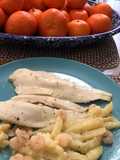Merluza al horno con gambitas y patatas, exprés