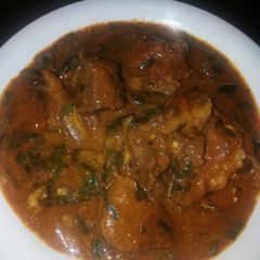 A picture of Ogbono soup with uziza leaves.