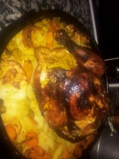 صورة لوصفة دجاجة محمرة محشية بالارز