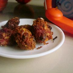 A picture of Red Spinach Fritters with a cheese cracker crust.