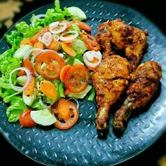 Peri Peri Chicken With Veggie Salad A picture of Peri Peri Chicken With Veggie Salad.