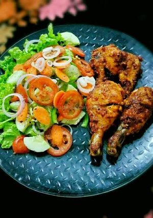 A picture of Peri Peri Chicken With Veggie Salad.