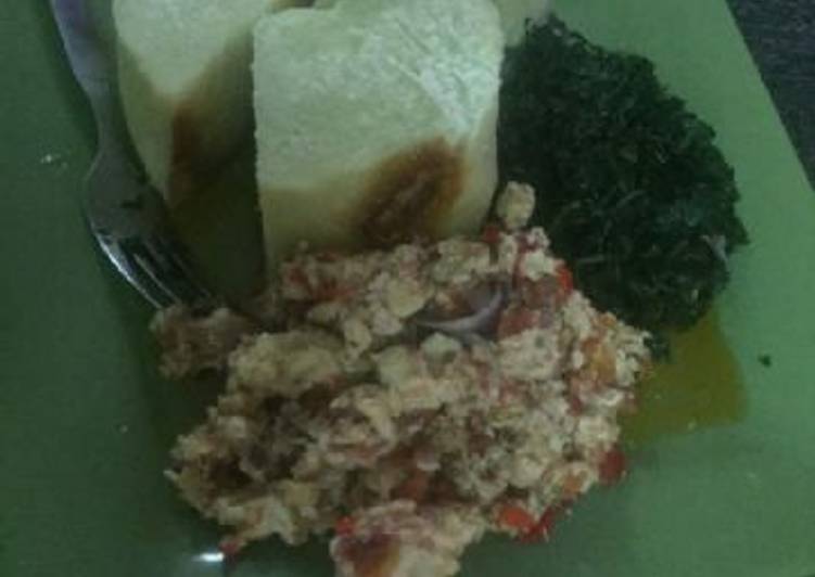 Boiled yam with egg sauce and vegetable