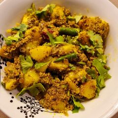 A picture of Aloo Posto (Potatoes in Poppy Seeds Paste).