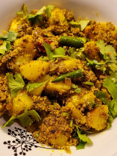 A picture of Aloo Posto (Potatoes in Poppy Seeds Paste).