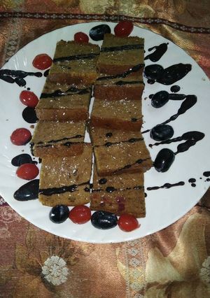 A picture of Organic jaggery cherry cake.