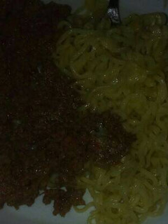 A picture of Minced meat and noodles.