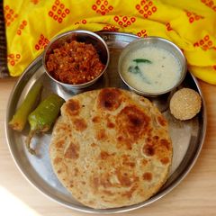 A picture of Simple paratha/Simple thaali.