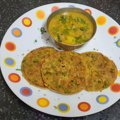 A picture of Barley flour masala bhakri {jau} & potato vegetable----- A Desi Platter.
