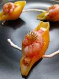 Conchiglione al primo sale di capra, gambero rosso e campari
