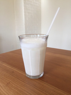 A picture of Cardamon Lassi (yogurt drink) - very simple, refreshing.