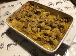 Une photo de Araignée de porc au four à l ananas,oignon,prune et curry