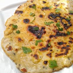 Garlic & Nigella Seed Flatbreads A picture of Garlic & Nigella Seed Flatbreads.