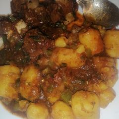 A picture of Green bananas with spicy beef.