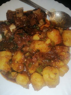 A picture of Green bananas with spicy beef.