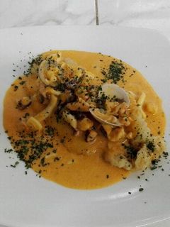 Una foto de Corvina en Salsa de Mariscos