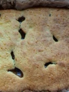 Una foto de Brownie de coco y dulce de leche
