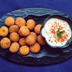 A picture of Fried Laddu Dhokli.