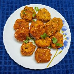 A picture of Fibre Rich Coconut Fritters or Narkoler Bora.