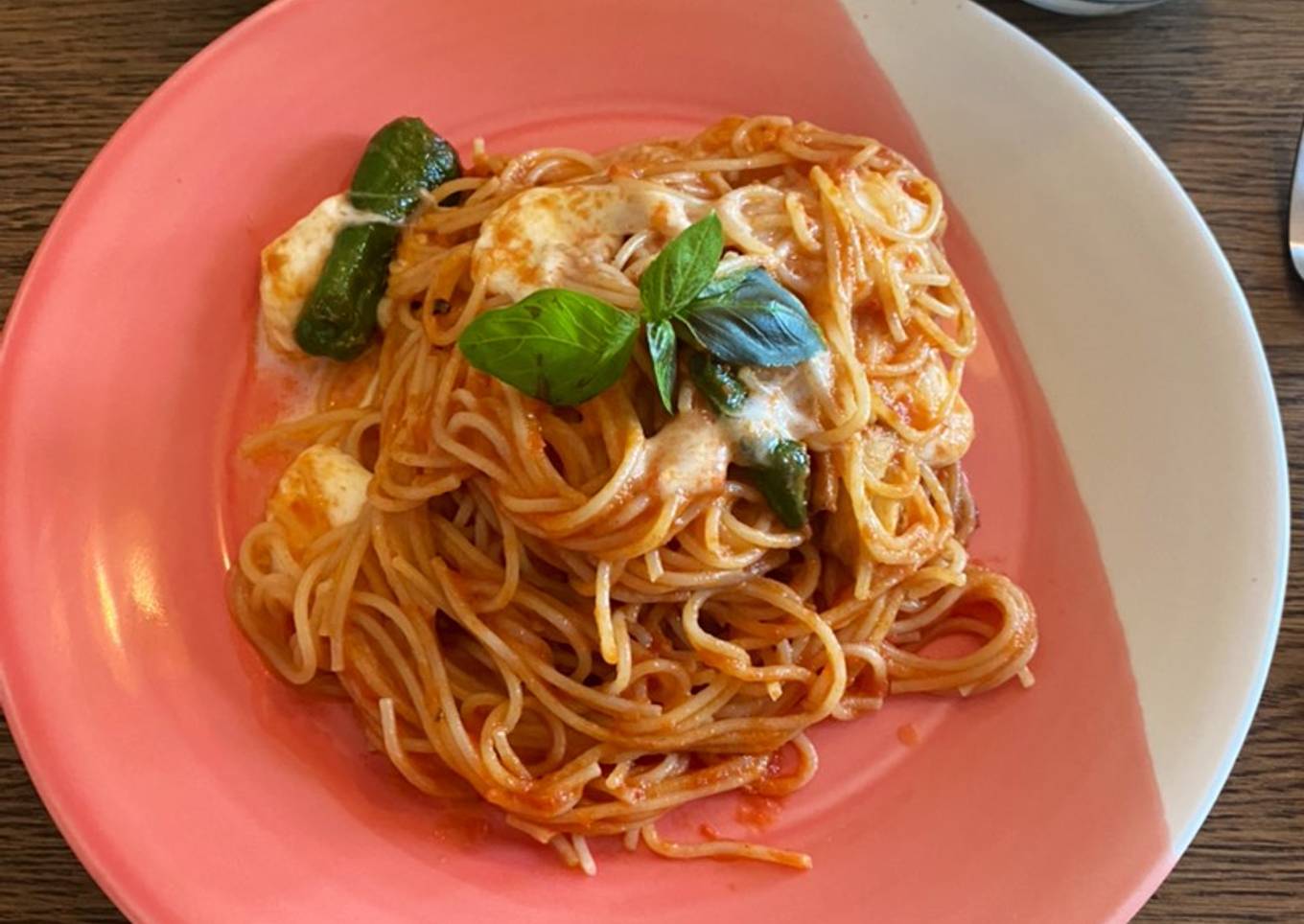 Simple tomato pasta with mozzarella and padron peppers
