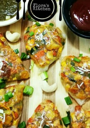 A picture of Vegetable paneer rice samosa.