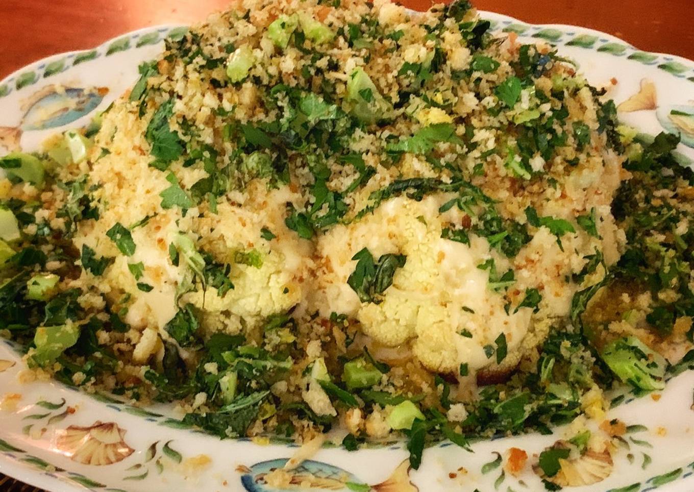 Roasted whole cauliflower with green tahini sauce