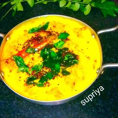 Kadhi with onion pakora A picture of Kadhi with onion pakora.