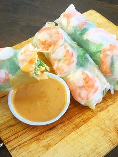 A picture of Prawn Vietnamese rice paper roll and peanut chilli dipping sauce.