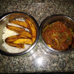 Rice, plantain and snail sauce A picture of Rice, plantain and snail sauce.