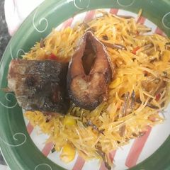 A picture of Abacha with fried fish.