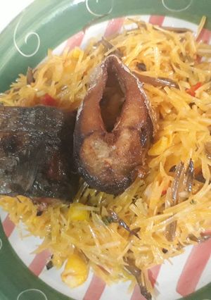 A picture of Abacha with fried fish.