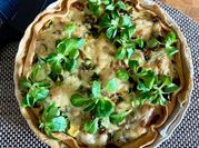Une photo de tarte raclette