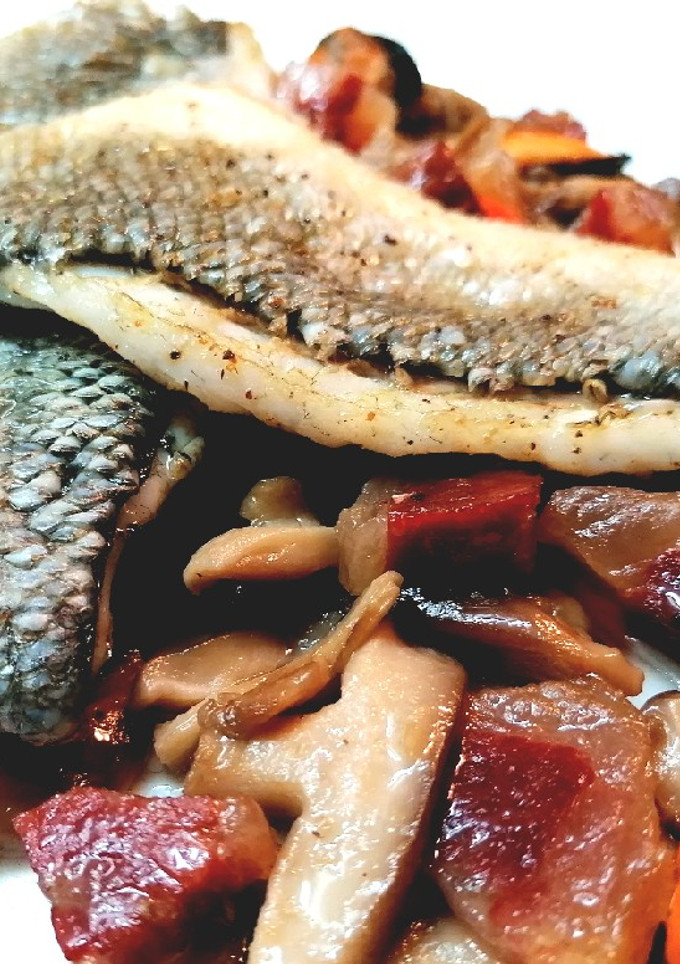 Una foto de Filetes de lubina mar y montaña