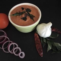 A picture of Onion tomato chutney.