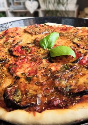 Une photo de Pizza parmigiana