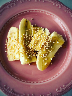 Foto di Banana grigliata con miele e quinoa soffiata